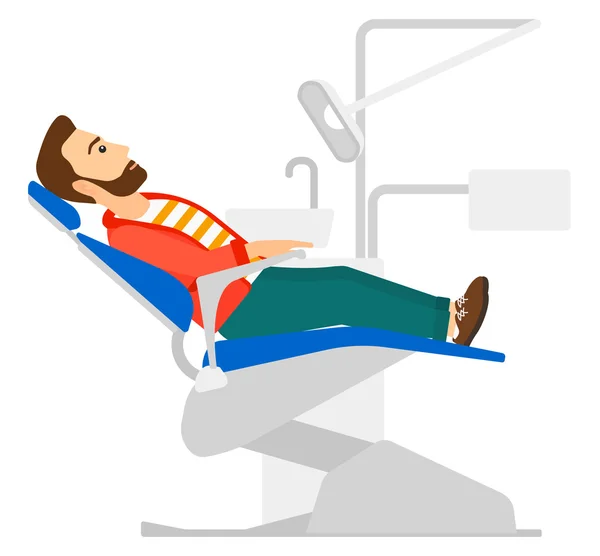 Пациент в стоматологическом кресле . — стоковый вектор