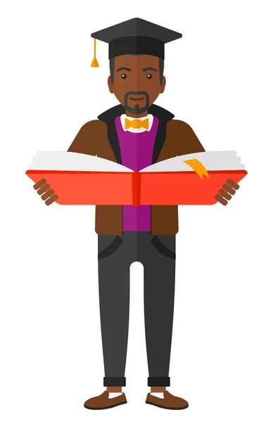 Hombre en el libro de tenencia de gorra de graduación . — Vector de stock