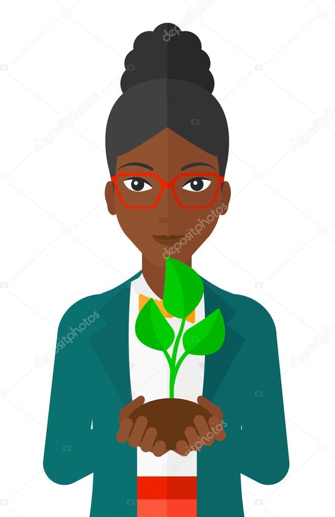 Woman holding plant.