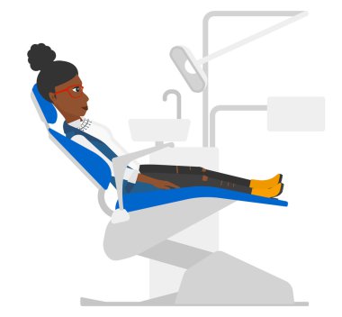 Patient in dental chair.