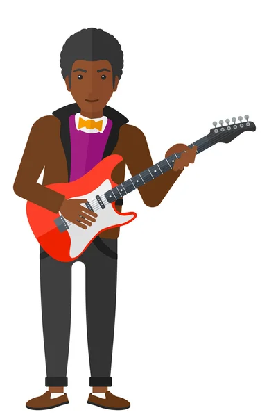 Hudebník hrající na elektrickou kytaru. — Stockový vektor