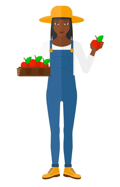 Αγρότης συλλέγοντας μήλα. — Διανυσματικό Αρχείο