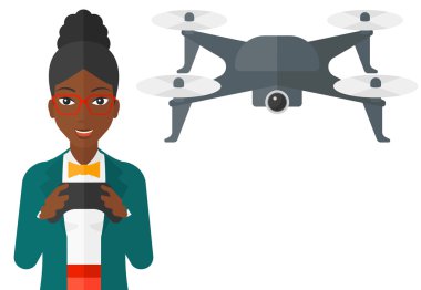 Woman flying drone.