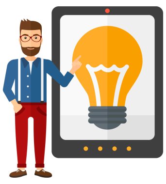 Man pointing at tablet computer with light bulb on screen.