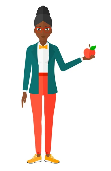 Frau hält Apfel. — Stockvektor
