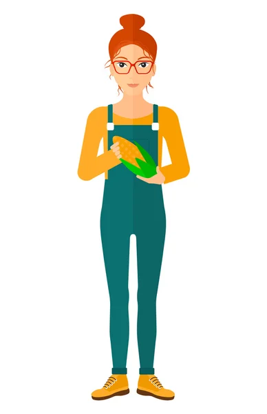 Farmer holding corn. — Stock Vector