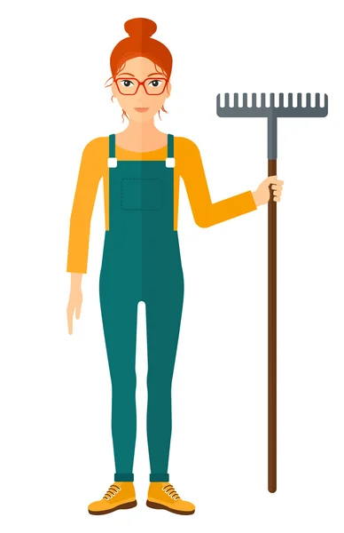 Farmer with rake. — Stock Vector