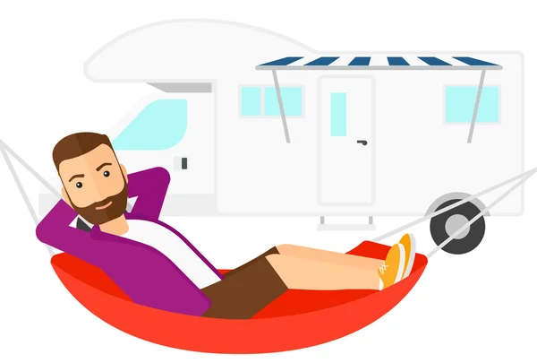 Homme couché dans l'hamac . — Image vectorielle