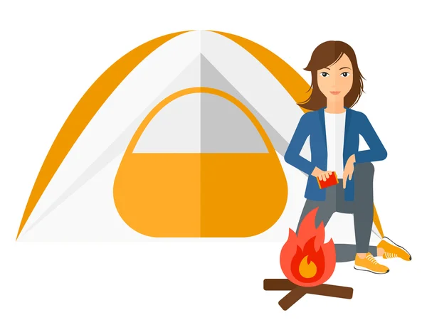 Woman kindling fire. — Stock Vector