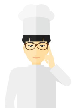 Chef pointing forefinger up.