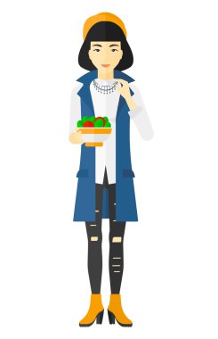 Salata yiyen kadın.