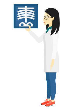 Doctor holding radiograph.