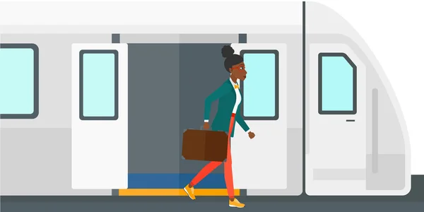 Vrouw gaan uit trein. — Stockvector