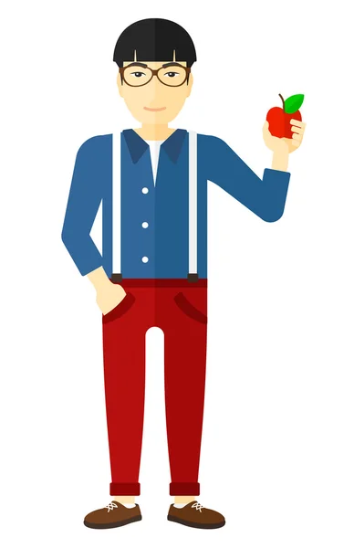 Hombre sosteniendo manzana . — Archivo Imágenes Vectoriales