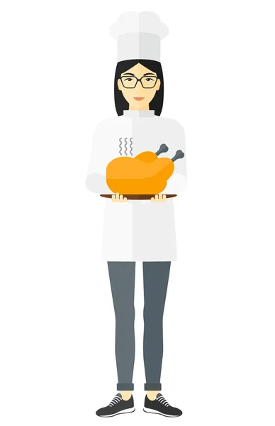 Woman holding roasted chicken. — ストックベクタ