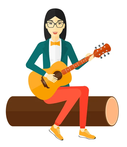 Žena hrající na kytaru. — Stockový vektor