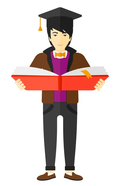 Hombre en el libro de tenencia de gorra de graduación . — Vector de stock