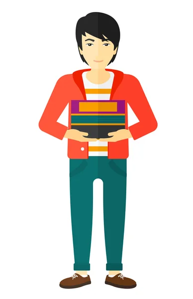 Hombre sosteniendo un montón de libros . — Vector de stock