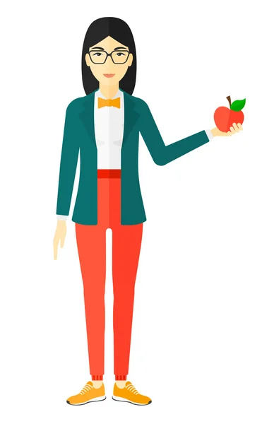 Жінка проведення яблуко . — стоковий вектор