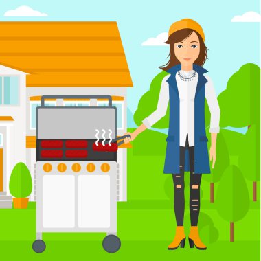 Kadın hazırlanıyor Barbekü.