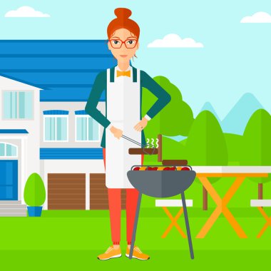 Kadın hazırlanıyor Barbekü.