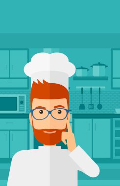 Chef pointing forefinger up.