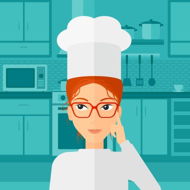 Chef pointing forefinger up.