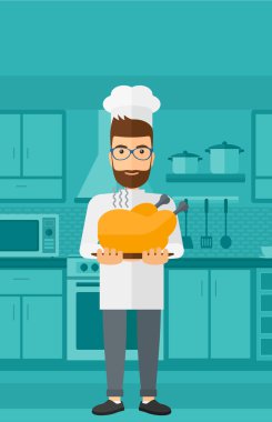 Man holding roasted chicken.