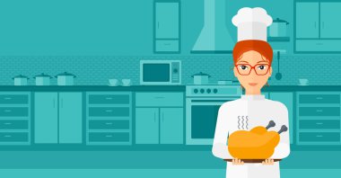 Woman holding roasted chicken.