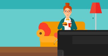 Hamburger yiyen kadın.