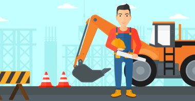 Kask ile mühendis ve blueprint.