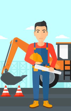 Kask ile mühendis ve blueprint.