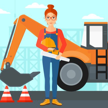 Kask ile mühendis ve blueprint.