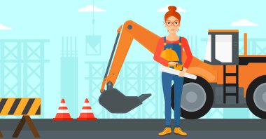 Kask ile mühendis ve blueprint.