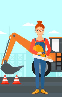 Kask ile mühendis ve blueprint.