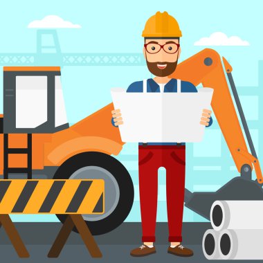 Bir plan tutan mühendisi.