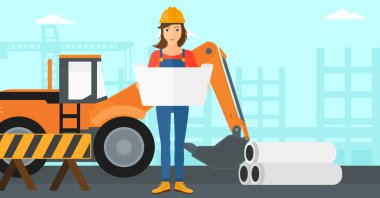 Bir plan tutan mühendisi.