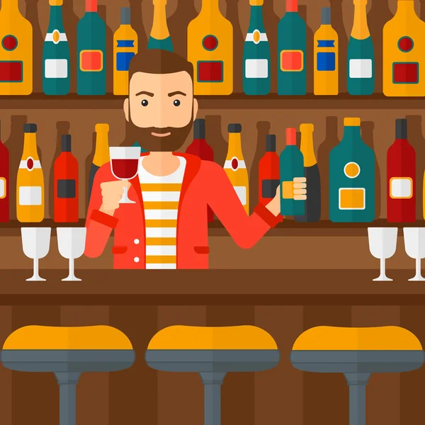 Camarero de pie en el mostrador del bar . — Vector de stock