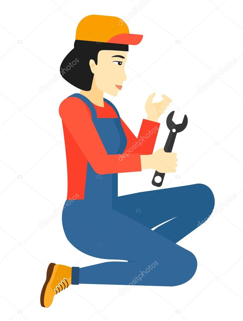 Repairer holding spanner.