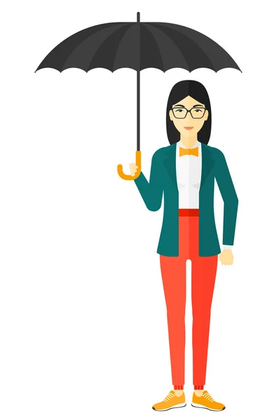 Business woman standing with umbrella. — Stockvector