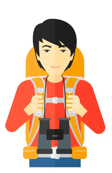 Cheerful backpacker with binoculars. — Stock Vector