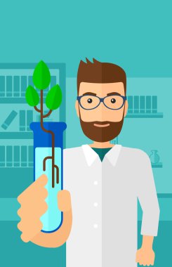 Test tüplü laboratuar asistanı.