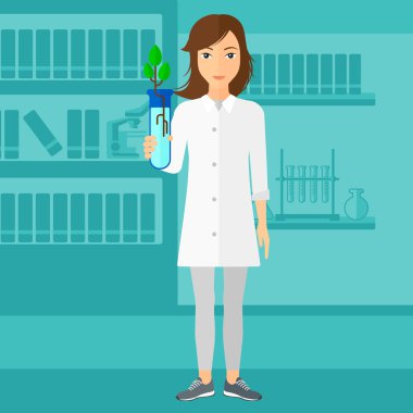 Test tüplü laboratuar asistanı.