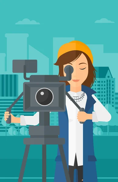 Жінка-камера з кінокамерою на штатив . — стоковий вектор
