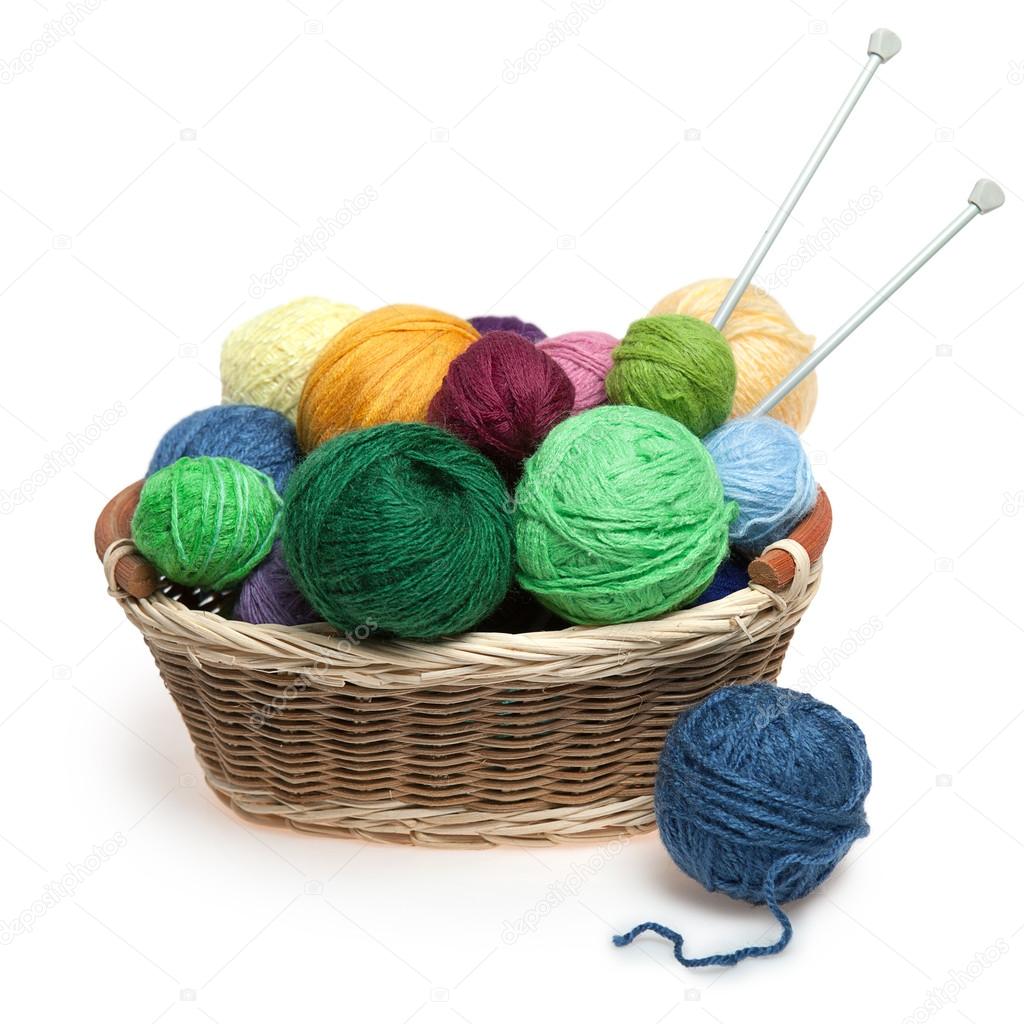 Knitting yarn balls and needles in basket Stock Photo by ©Ziablik 63109799