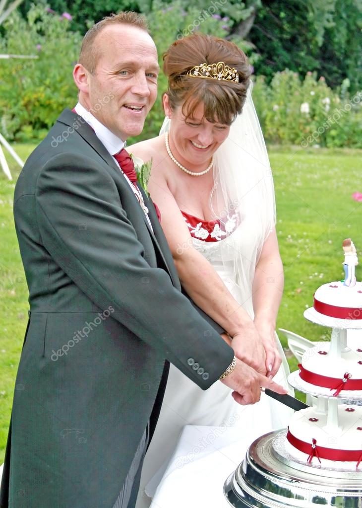 Bride and Groom cutting the Cake