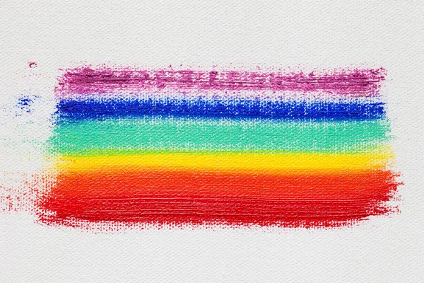 Pinceladas multicolor arco iris sobre lienzo artista —  Fotos de Stock