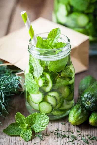 Cold summer drink from cucumbers with peppermint — Stock Photo, Image