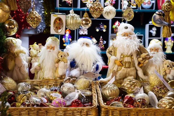 Santa Claus dolls and glass — Stock Photo, Image