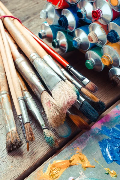 Vintage stylized photo of paintbrushes closeup, open multicolor — Stock Photo, Image